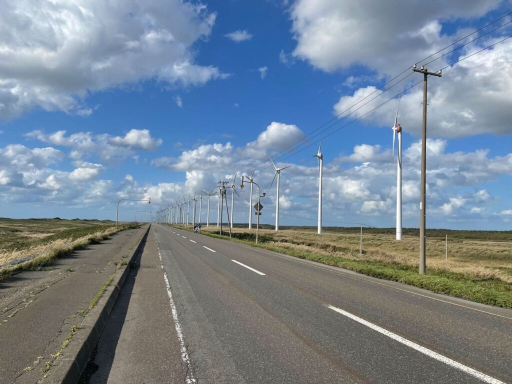 Straight national highway and wind turbines across the Sarobetsu plain (Horonobe)